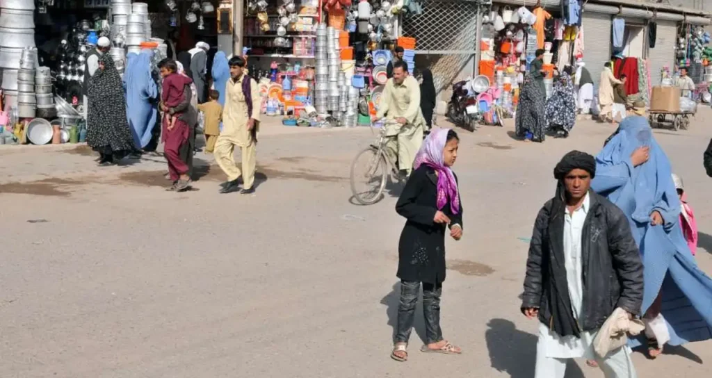 herat city dwellers conduct daily business in herat